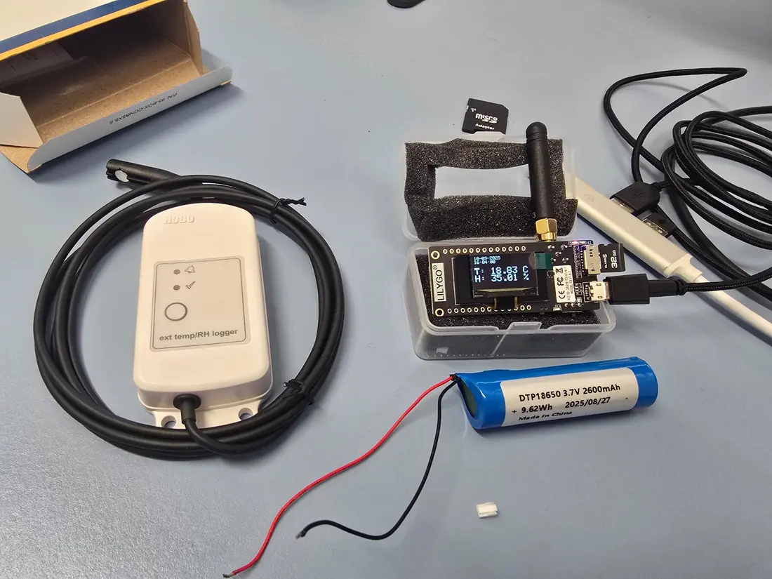 HOBO MX2302A sensor beside the Krytek field node displaying live temperature and humidity observations